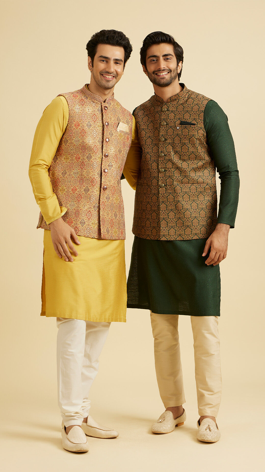 Men showcasing stylish golden and brown Nehru jackets paired with white juttis, a perfect fusion look for weddings.